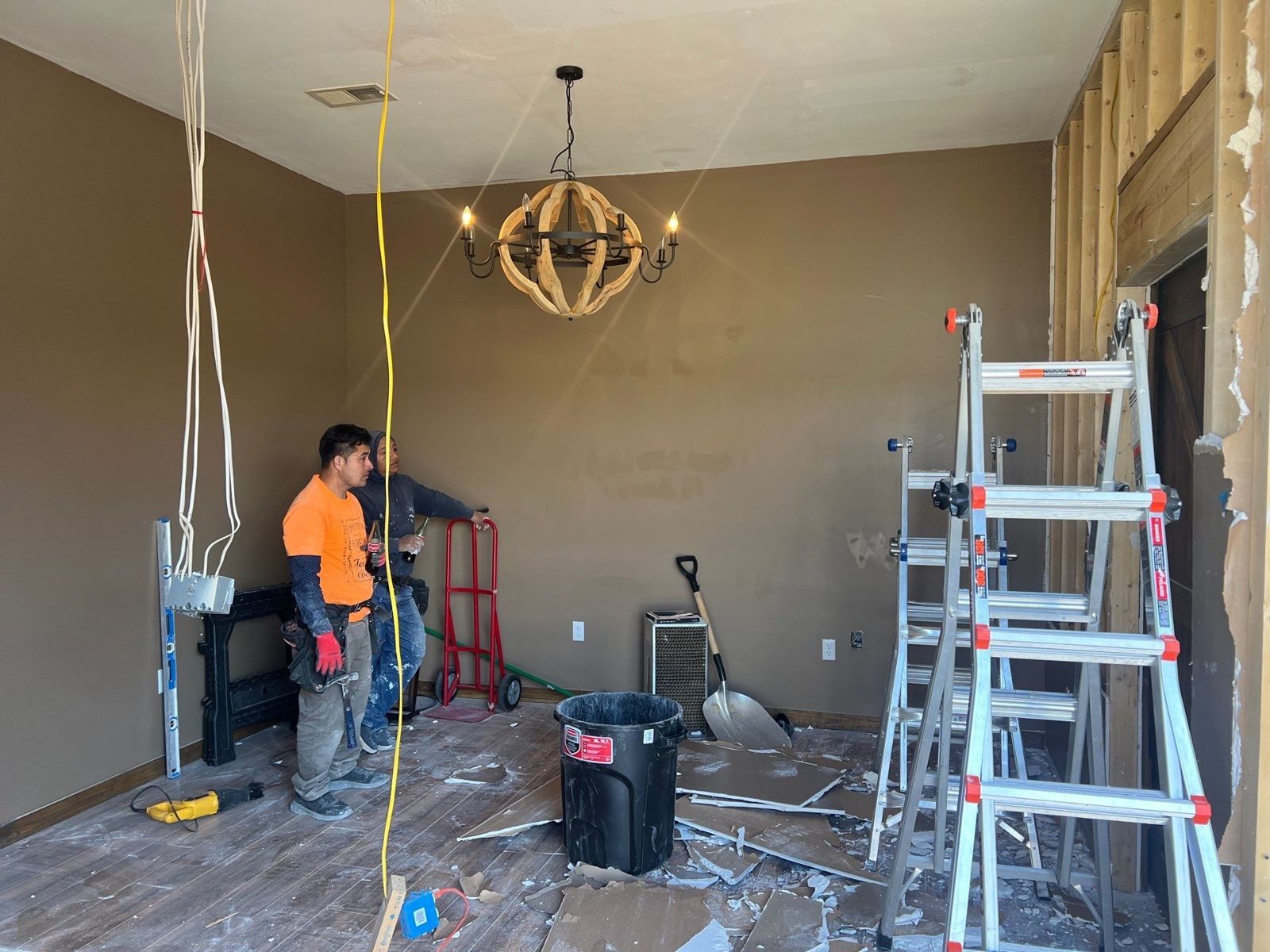 Rivco crew opening up the neighboring unused room during demolition