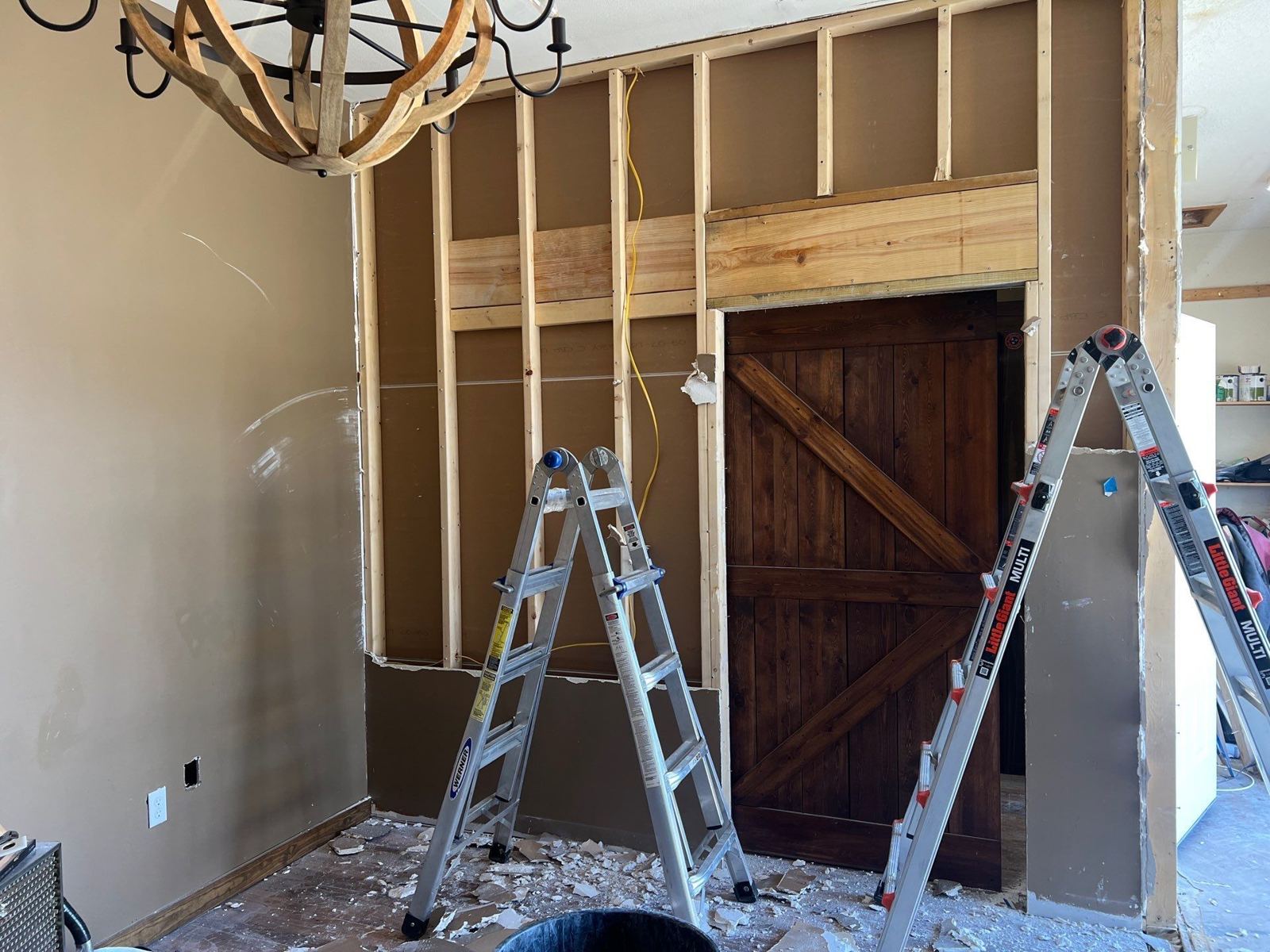 New header framing over the doorway before drywall