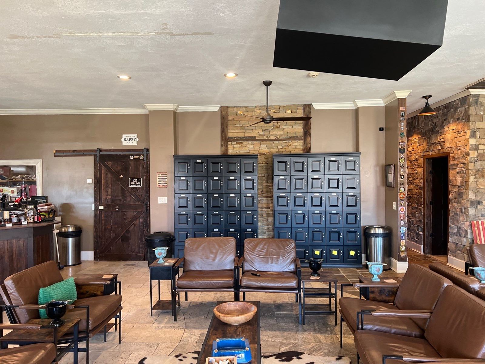 Scenic City Cigars lounge with leather seating and cigar lockers, Chattanooga